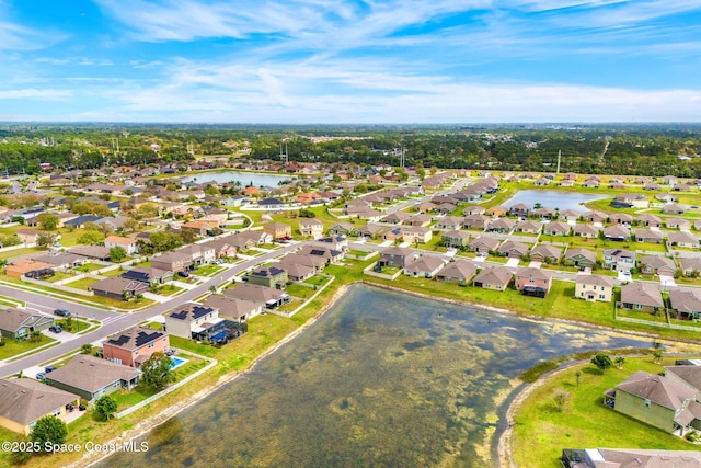 aerial view featuring a residential view and a water view