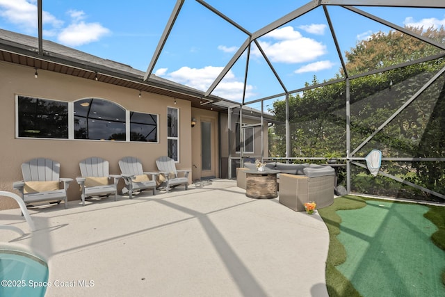 view of patio with a lanai