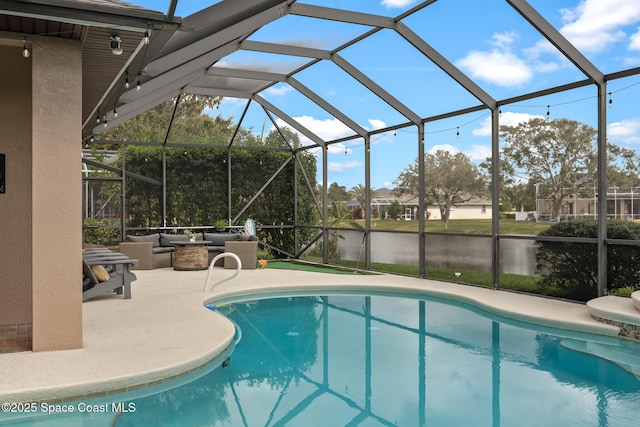 pool with a patio area, a lanai, and a water view