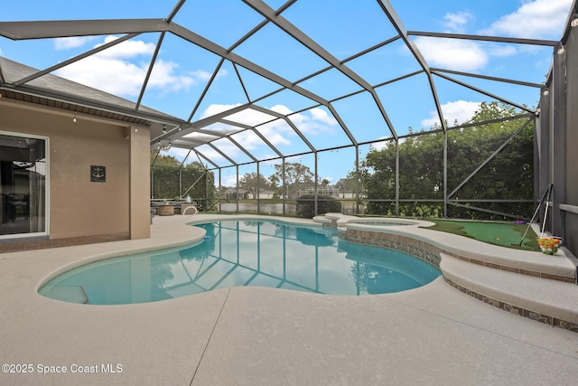 view of pool featuring a lanai, a patio area, and a pool with connected hot tub