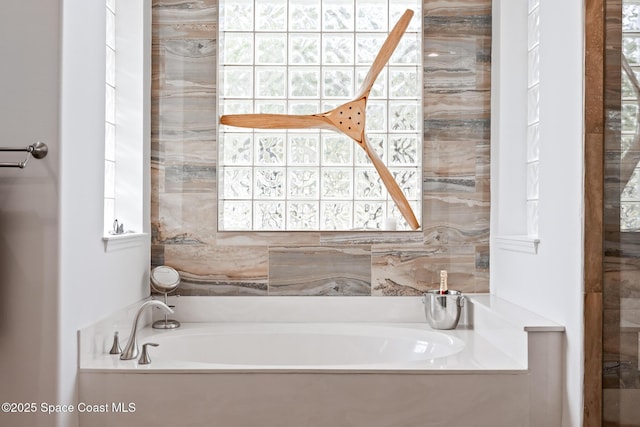 bathroom featuring a garden tub