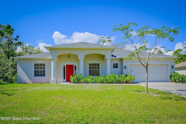 view of front of home featuring driveway, a front lawn, an attached garage, and stucco siding