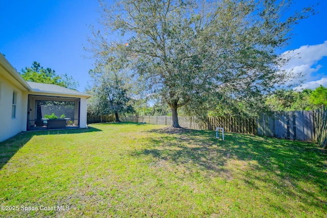 view of yard featuring a fenced backyard