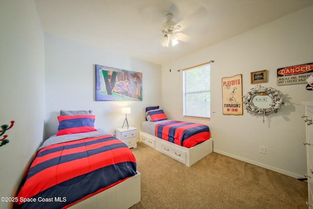 bedroom featuring carpet floors and baseboards