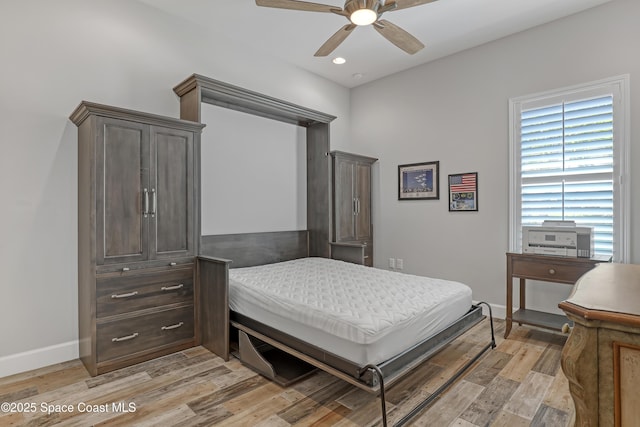 bedroom with a ceiling fan, recessed lighting, baseboards, and light wood-type flooring