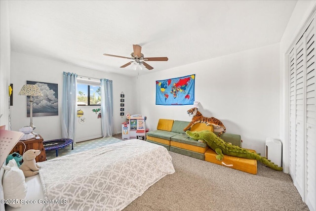 bedroom with carpet and ceiling fan