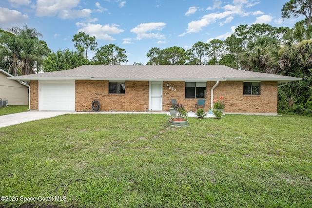 single story home with a garage, concrete driveway, a front lawn, and brick siding