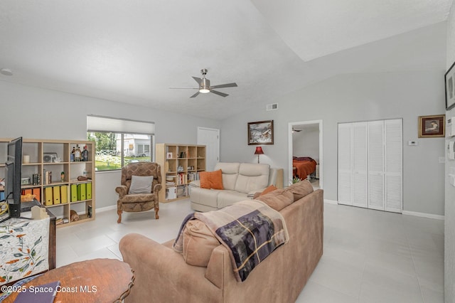 living room featuring baseboards, visible vents, ceiling fan, tile patterned flooring, and vaulted ceiling