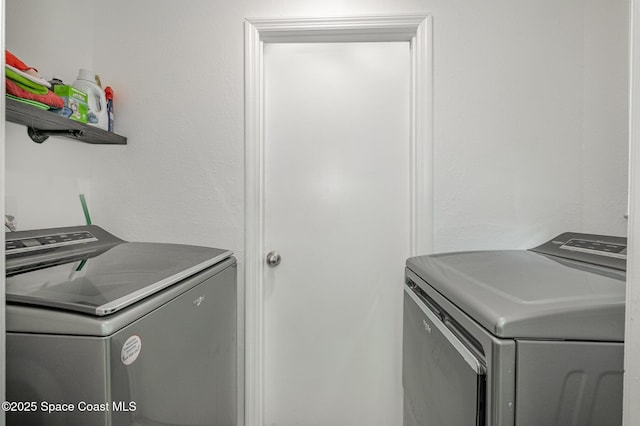 laundry room featuring laundry area and washer and dryer