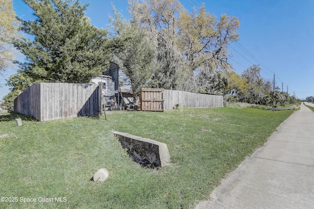 view of yard featuring fence