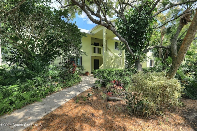 view of front of house with stairway