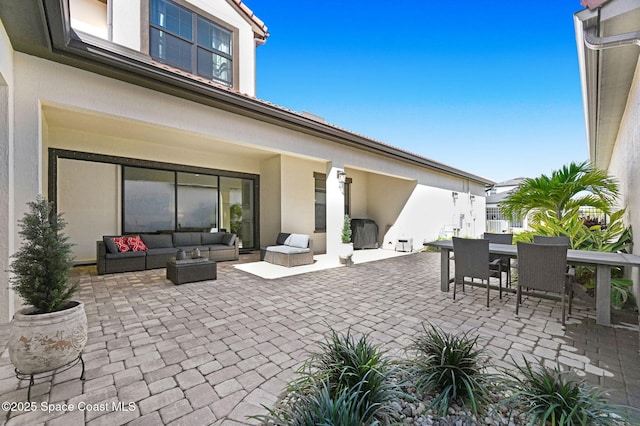 view of patio / terrace with an outdoor hangout area and outdoor dining area
