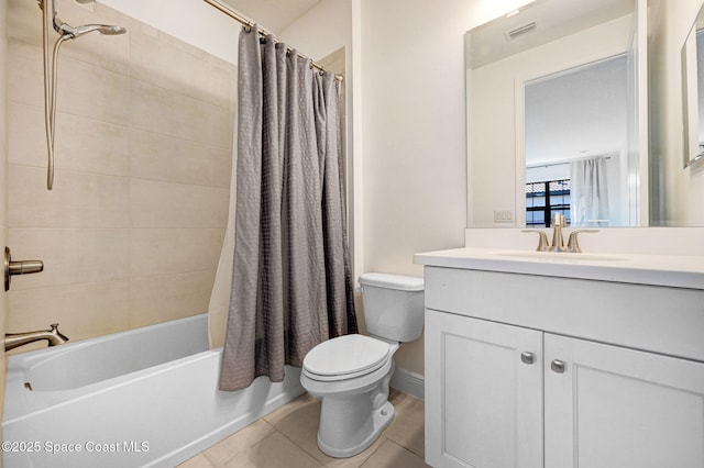 full bath featuring vanity, visible vents, tile patterned flooring, shower / tub combo, and toilet
