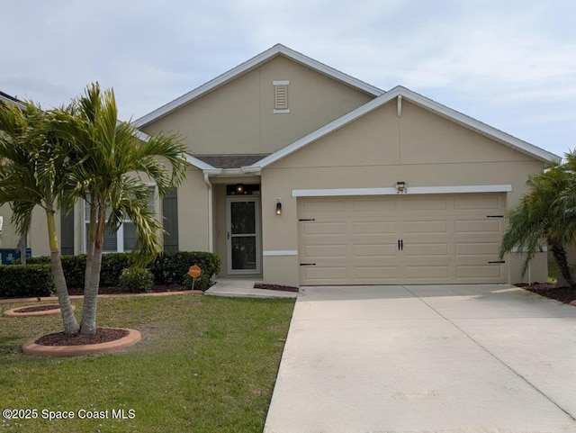 ranch-style house featuring driveway, a front yard, an attached garage, and stucco siding