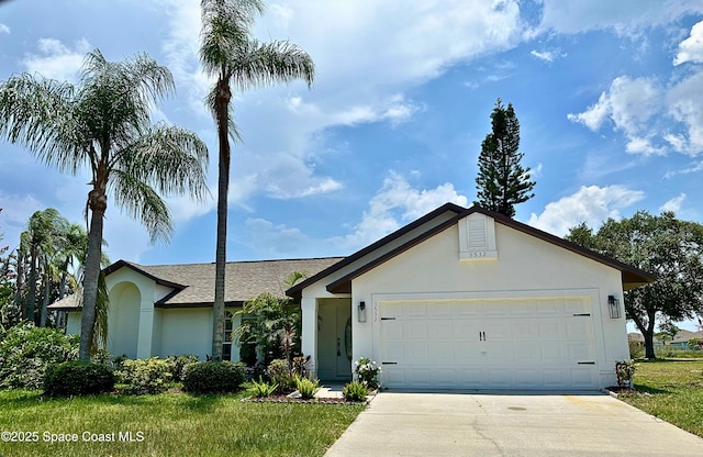 single story home featuring a garage, concrete driveway, and stucco siding