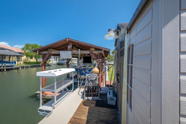 dock area with a water view