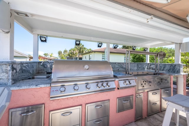 view of patio / terrace with a sink and area for grilling