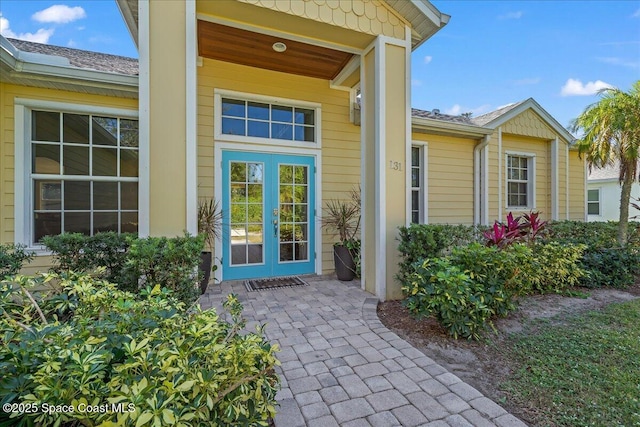 entrance to property featuring french doors