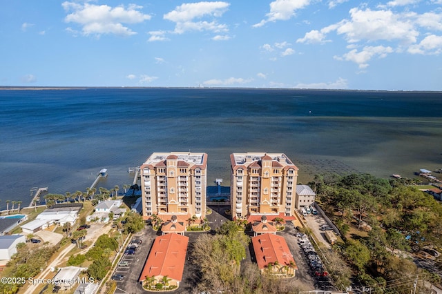 drone / aerial view with a water view