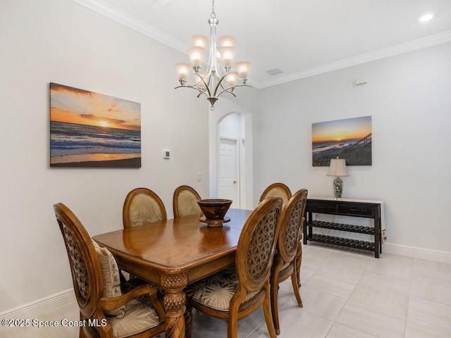 dining area featuring arched walkways, light tile patterned flooring, a notable chandelier, baseboards, and ornamental molding