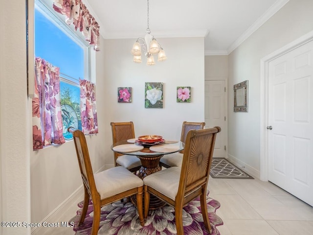 dining space featuring a chandelier, light tile patterned flooring, crown molding, and baseboards