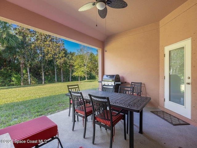 view of patio / terrace featuring ceiling fan, outdoor dining space, and a grill