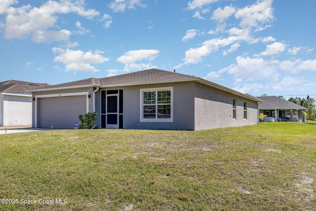 ranch-style home featuring stucco siding, an attached garage, driveway, and a front lawn