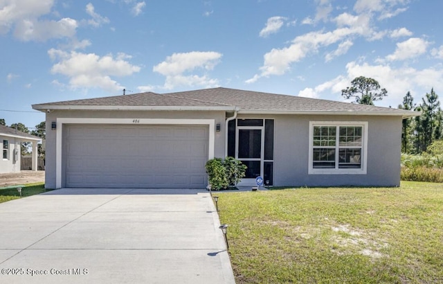406 Alamo St, Palm Bay, FL 32909 - view of front of property featuring stucco siding, driveway, an attached garage, and a front yard