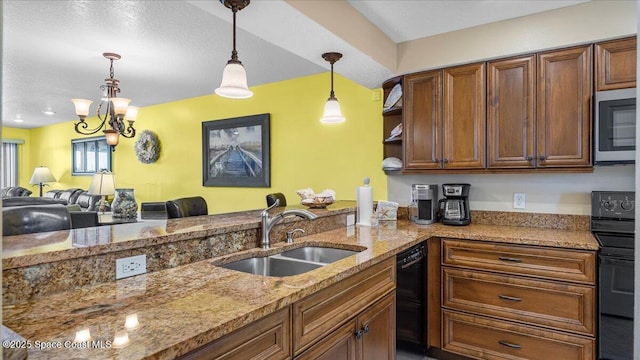 kitchen with stainless steel microwave, hanging light fixtures, open floor plan, a sink, and black range with electric cooktop