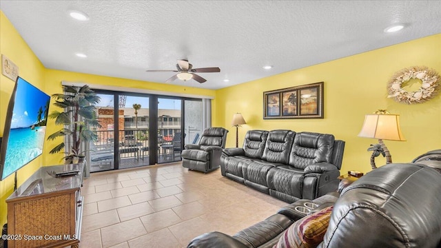 living room featuring recessed lighting, a ceiling fan, a textured ceiling, and tile patterned floors