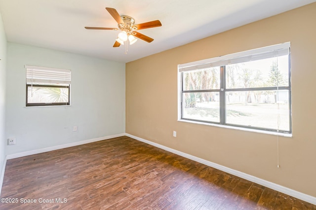 718 6th St, Merritt Island, FL 32953 - empty room with baseboards, wood finished floors, and ceiling fan