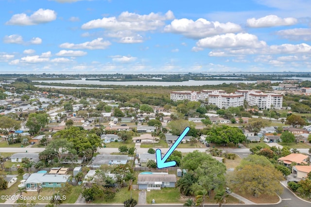 718 6th St, Merritt Island, FL 32953 - aerial view of a nearby body of water and a notable bridge