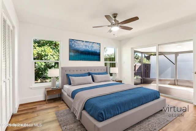 bedroom with baseboards, light wood-style floors, ceiling fan, and access to outside