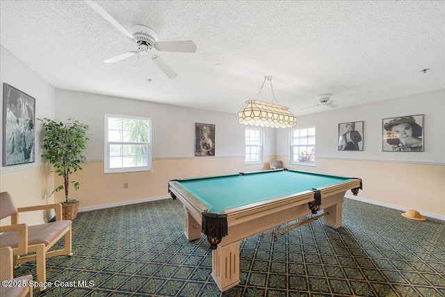 game room with carpet floors, a textured ceiling, a ceiling fan, and pool table