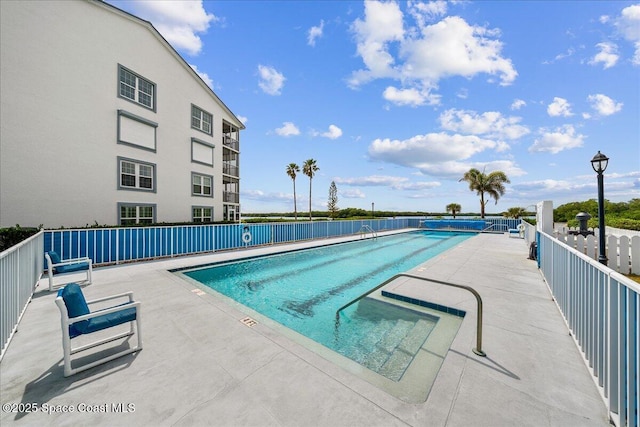 pool with a patio