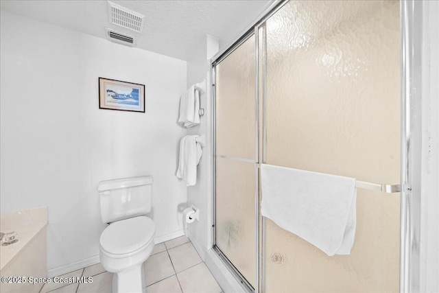 full bathroom with toilet, a stall shower, tile patterned flooring, and visible vents