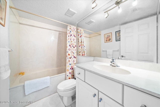 full bathroom featuring visible vents, a textured ceiling, toilet, and shower / bath combo with shower curtain