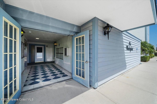 view of exterior entry with french doors