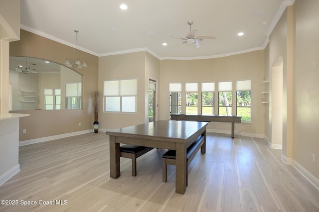 recreation room featuring crown molding, light wood-style flooring, and baseboards