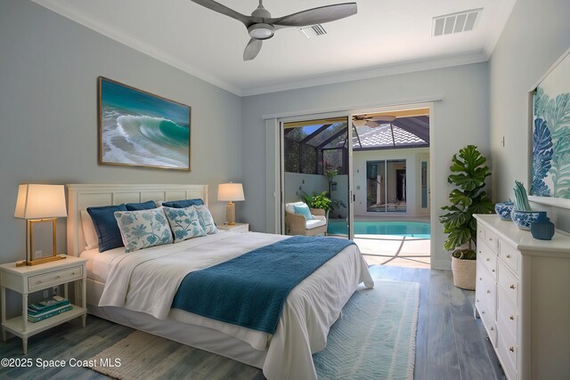 bedroom featuring access to outside, wood finished floors, visible vents, and crown molding