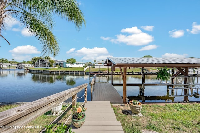 dock area featuring a water view