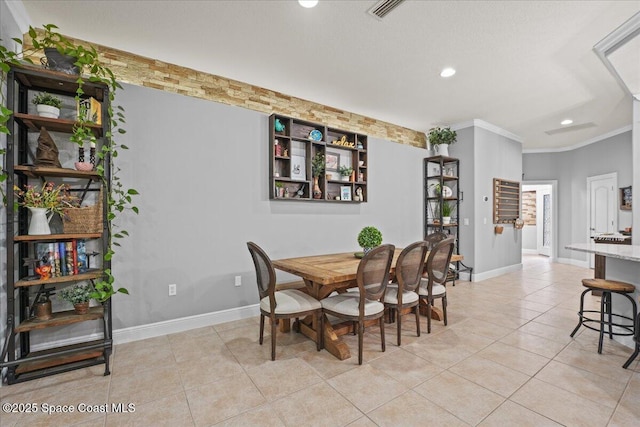 dining area with light tile patterned floors, recessed lighting, visible vents, baseboards, and ornamental molding