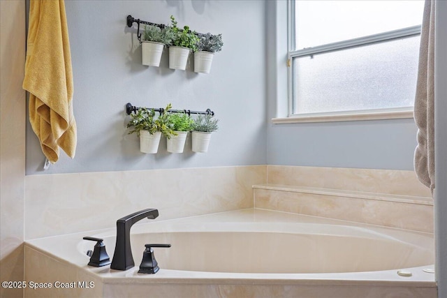 bathroom featuring a garden tub