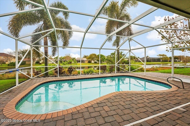 pool with a lanai and a patio