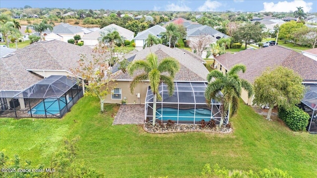 drone / aerial view with a residential view