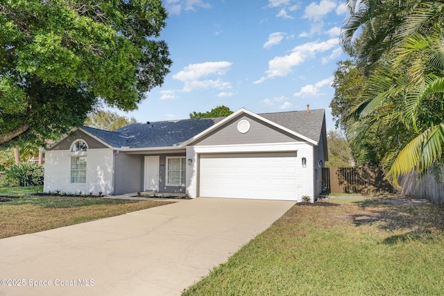 ranch-style house with a front yard, fence, a garage, and driveway