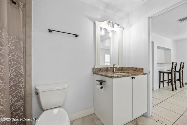 full bathroom with baseboards, visible vents, vanity, and toilet