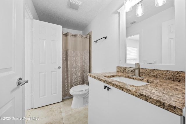 full bath featuring a textured ceiling, curtained shower, tile patterned flooring, toilet, and vanity