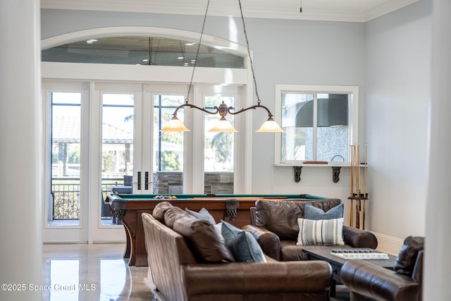 living area with pool table and crown molding