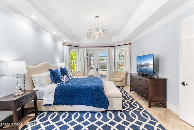 bedroom featuring an inviting chandelier, ornamental molding, french doors, a raised ceiling, and access to outside